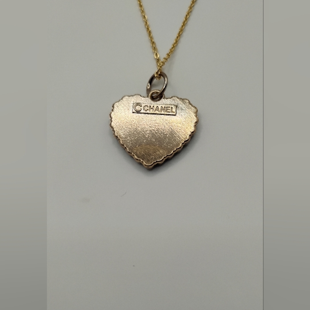 Chanel Black and Gold Heart Authentic Charm On A Stainless Steel Necklace - Picture 2 of 3